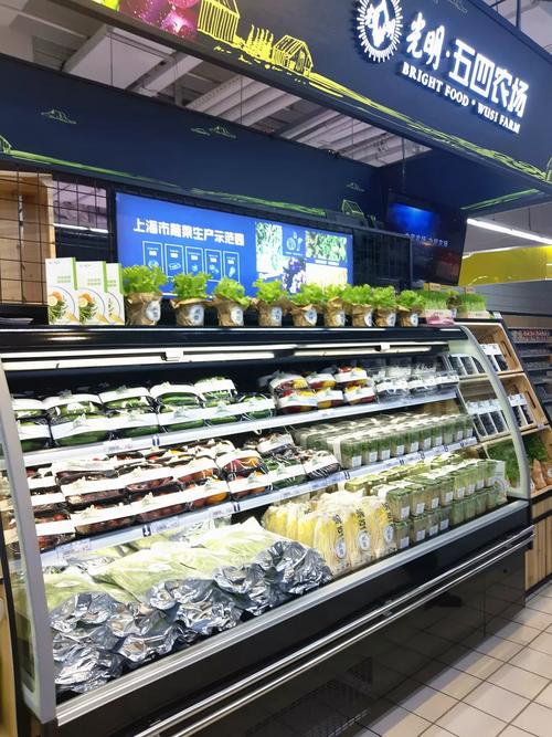 集團董事長是明芳視察農工商118廣場五四農產品專柜